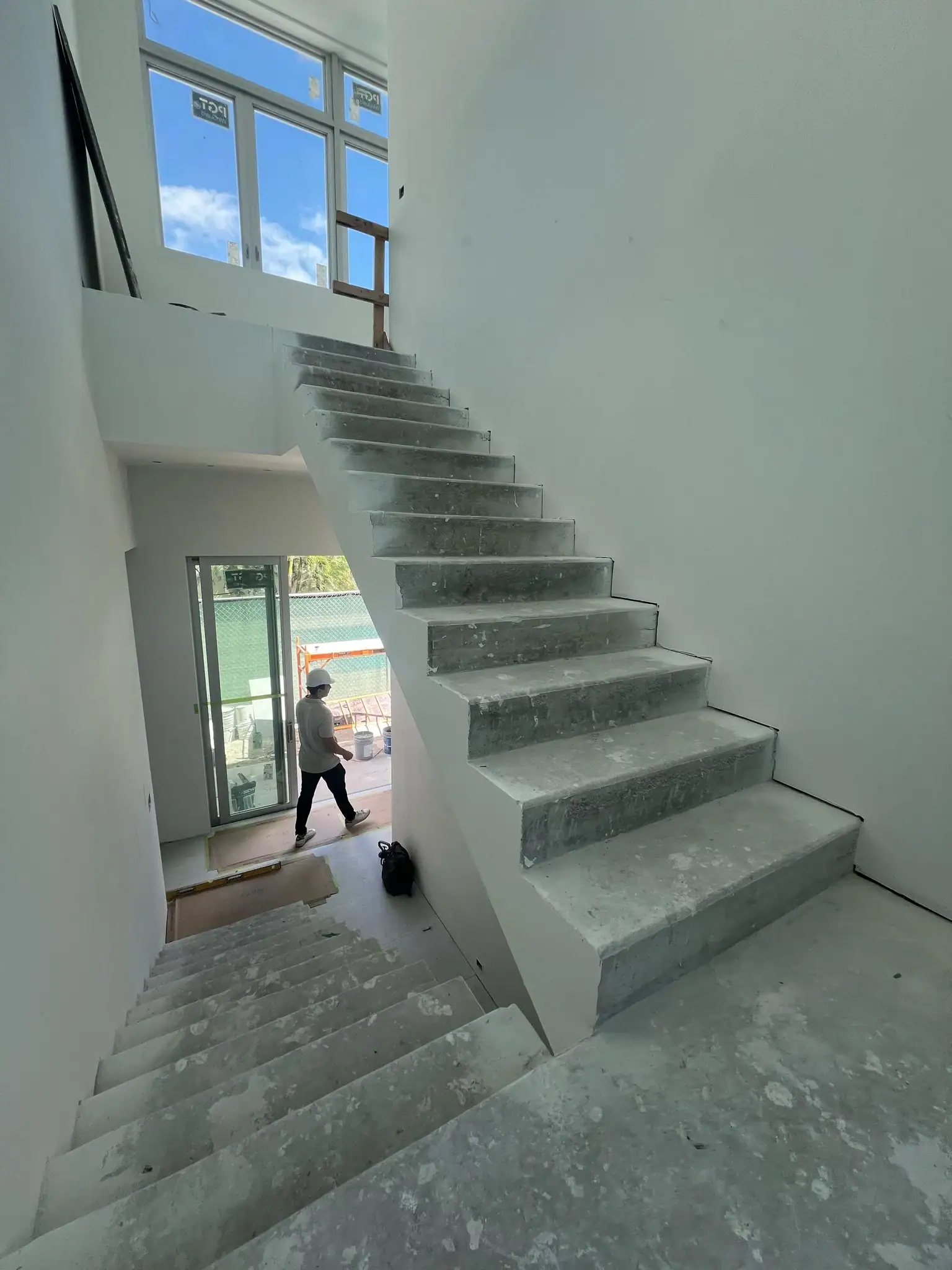 Standoff Glass Railing in Lakeside Residence