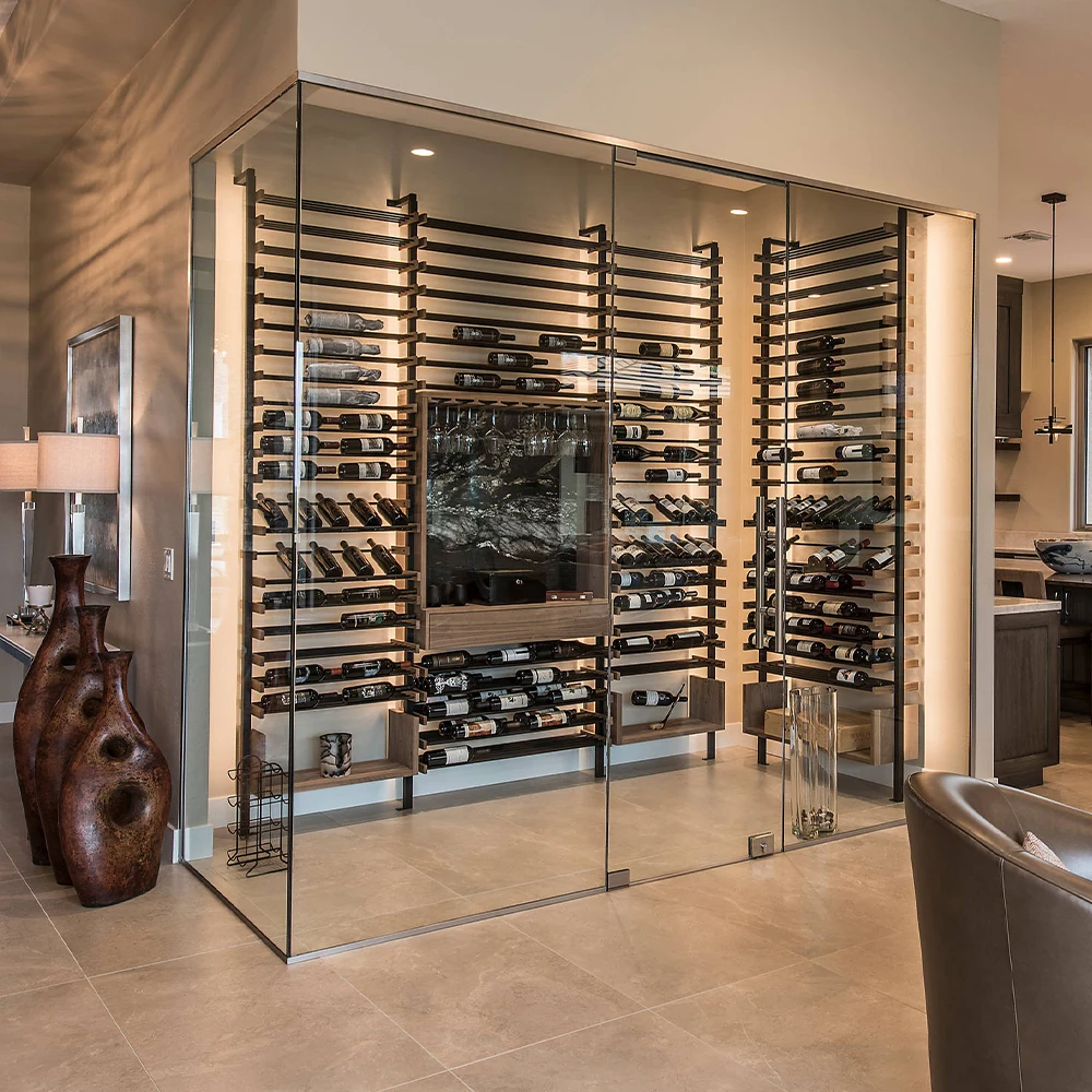 Luxurious glass and mirror wine cellar with sleek design and ample storage space.