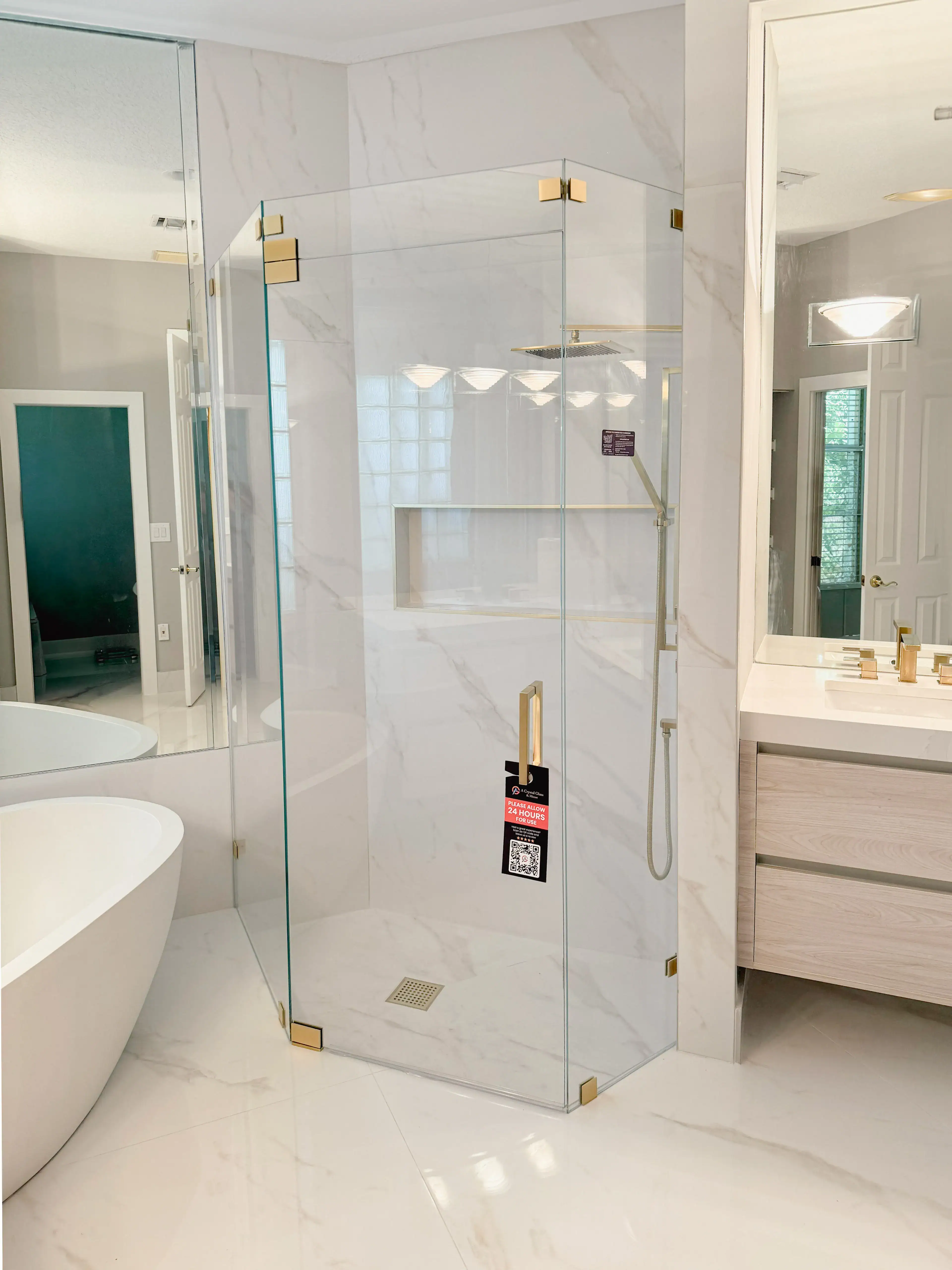 High-quality glass shower enclosure with marble walls, gold accents, and modern design. Perfect for luxury bathroom upgrades.