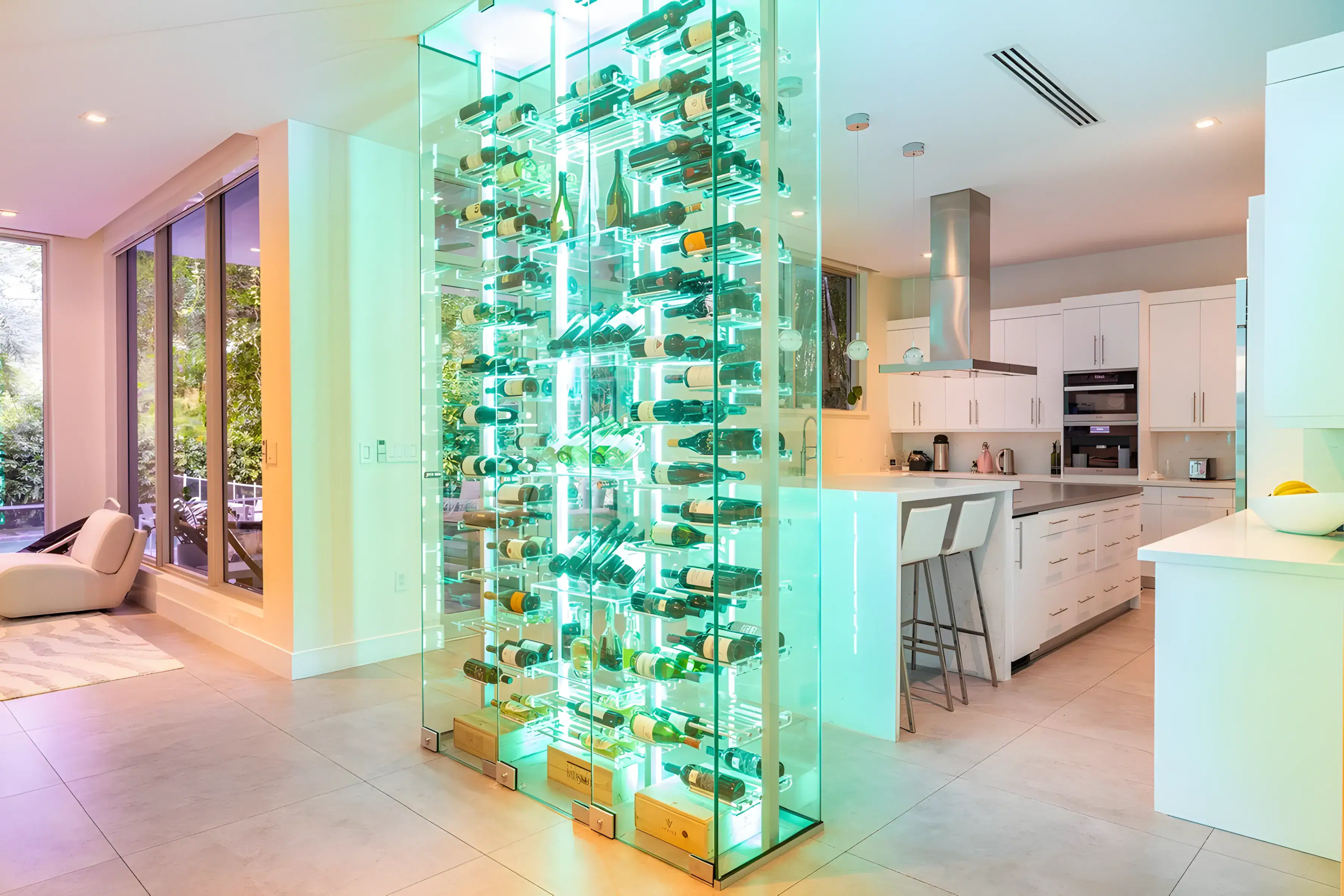 Stylish wine bottle display case in modern kitchen.