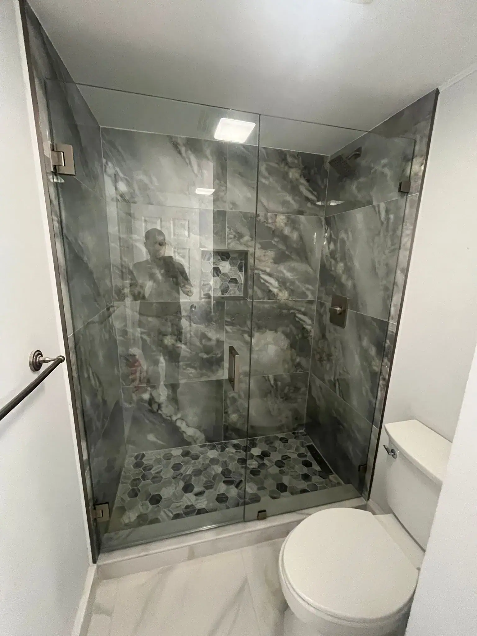 High-quality glass shower door with modern design.