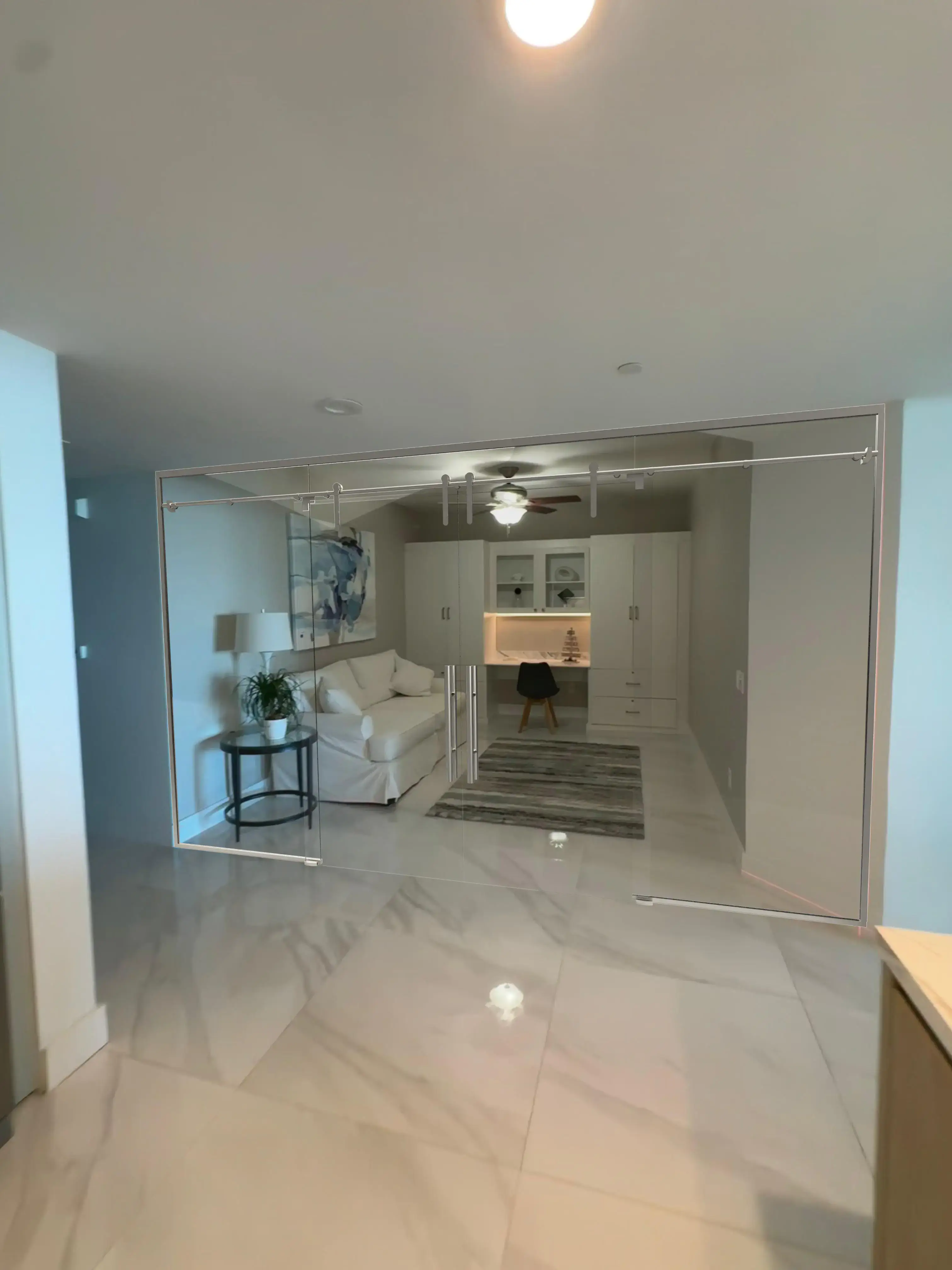 Glass room divider, modern transparent partition, interior home decor, stylish glass wall, elegant interior space.