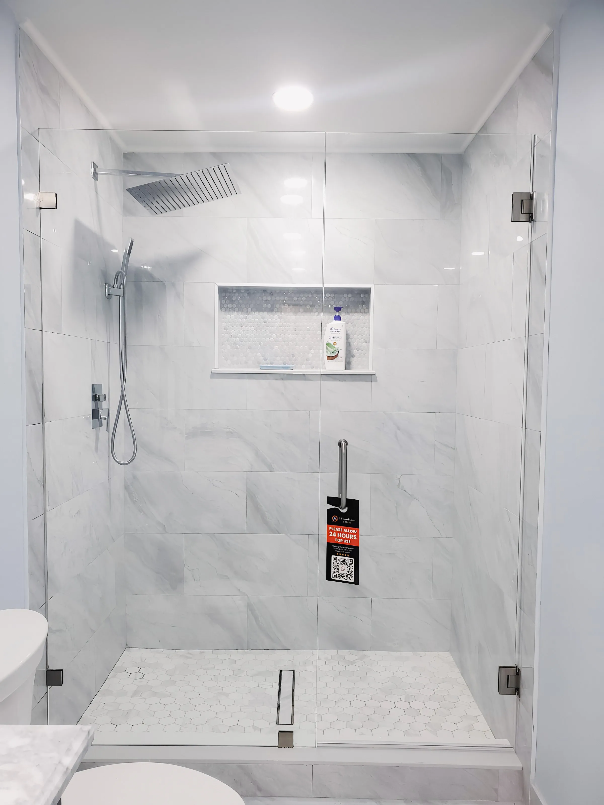 High-quality glass shower enclosure with sleek design and modern fixtures. Durable, stylish, and perfect for a luxury bathroom.