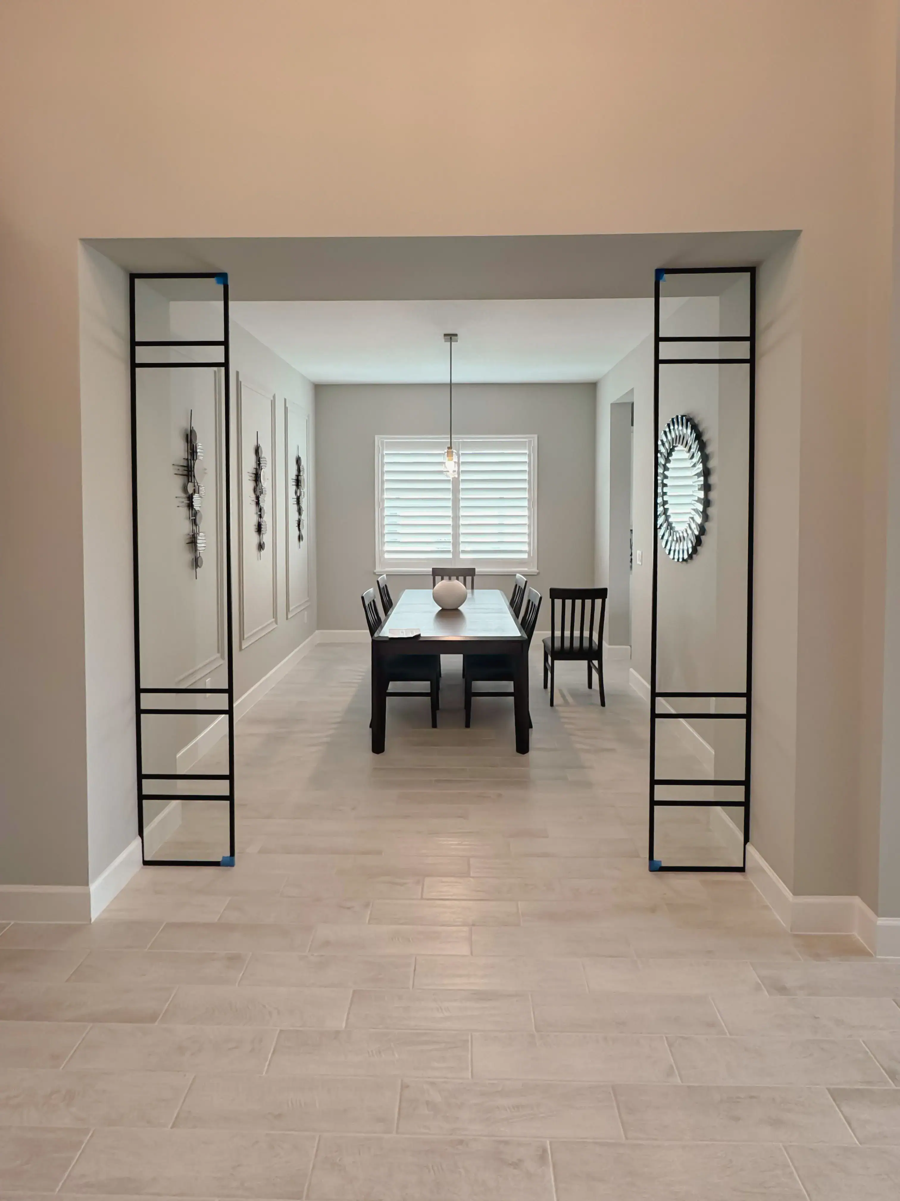 Beautiful modern mirror with sleek black frame for home decor.