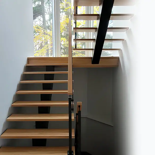 The Seattle stairs combine steel integrity with invisible craftsmanship. Built around a central spine, each step is engineered for silent impact.