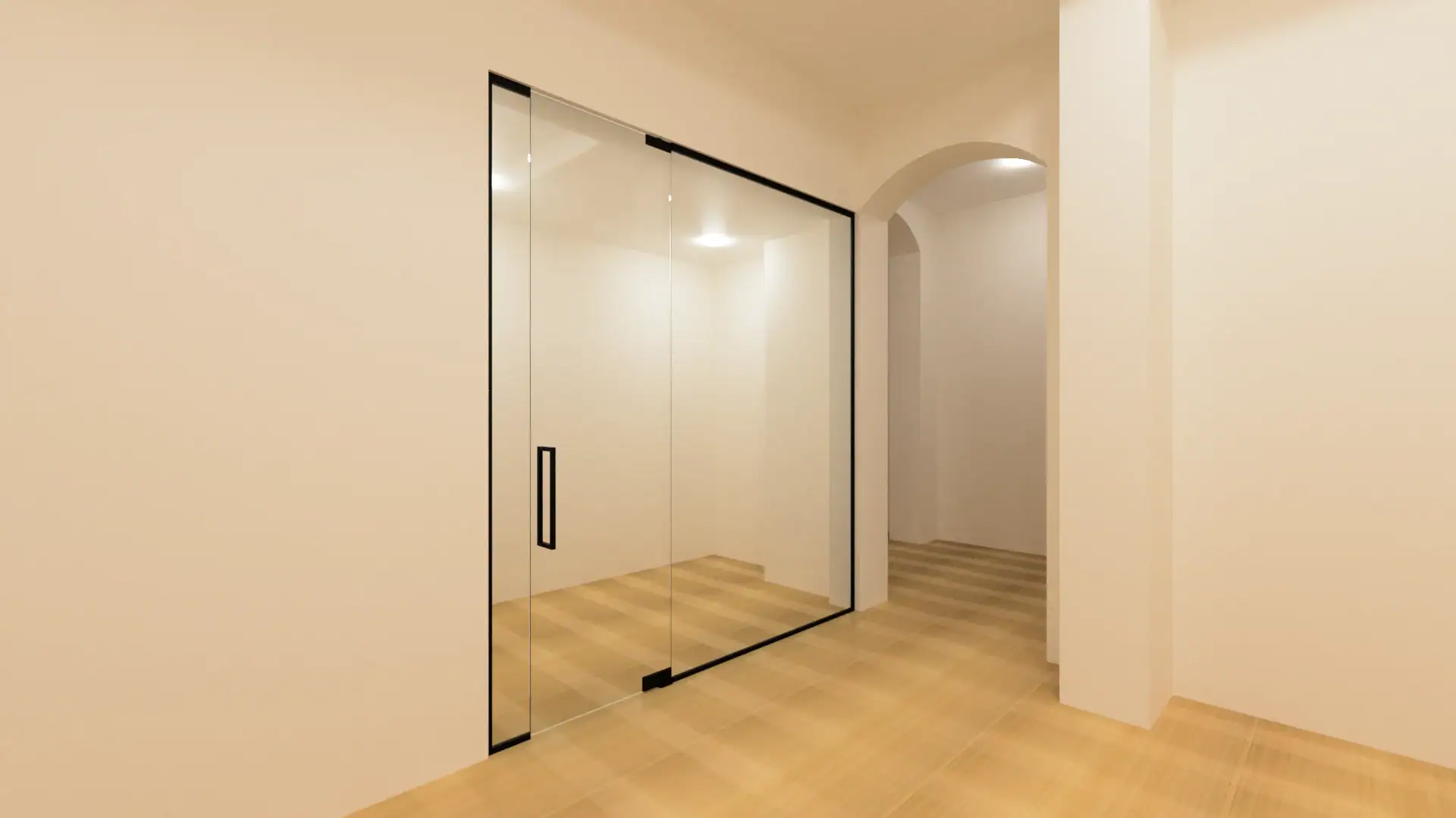 Bright modern interior with sleek glass and mirror sliding door. Elegant design enhances contemporary home style.
