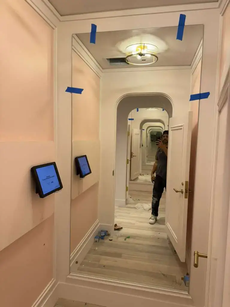 Reflective mirror with framing for home decor, mirror installation, and interior design.