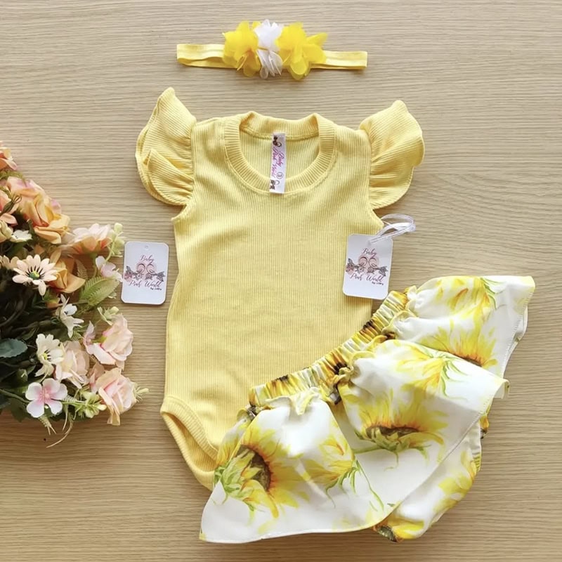 Ropa y accesorios bebé niña en tonos amarillos y florales.